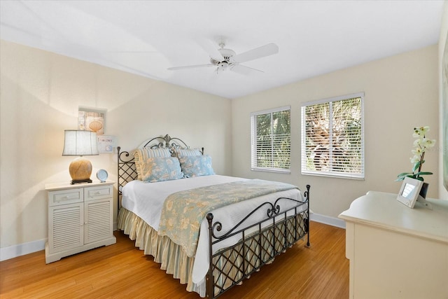 bedroom featuring ceiling fan and light wood-type flooring