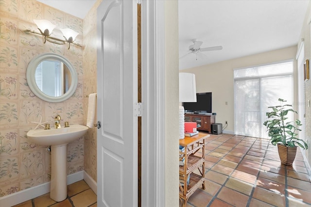 bathroom featuring tile patterned flooring and ceiling fan