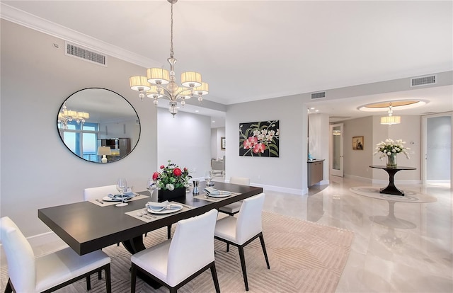 dining room featuring an inviting chandelier and crown molding