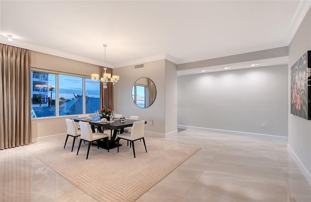 dining space with a notable chandelier and crown molding