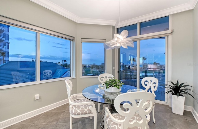 dining room with crown molding