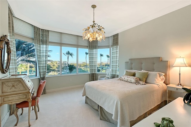 carpeted bedroom with an inviting chandelier