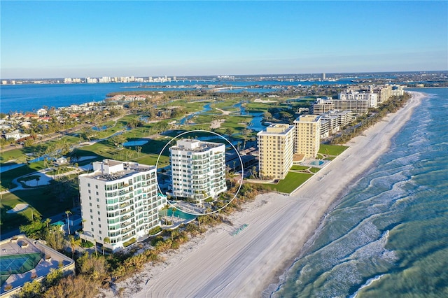 bird's eye view with a beach view and a water view