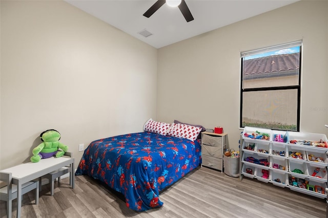 bedroom featuring ceiling fan and light wood-type flooring