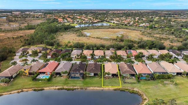 drone / aerial view featuring a water view