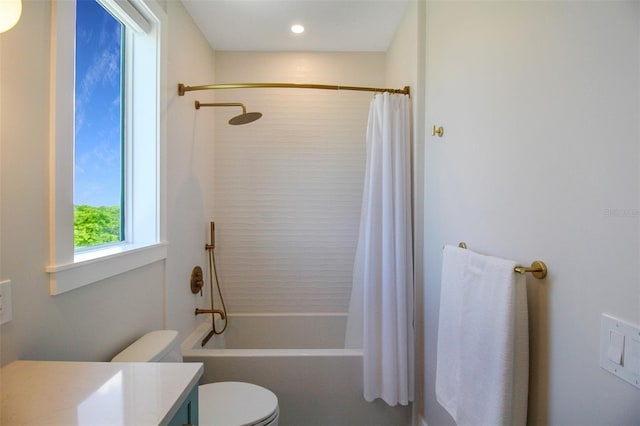 full bathroom with vanity, toilet, and shower / bathtub combination with curtain