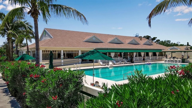 view of swimming pool with a patio area