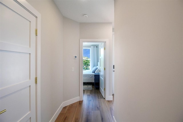 corridor featuring light hardwood / wood-style floors