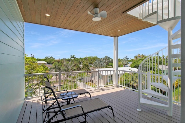 wooden deck with ceiling fan