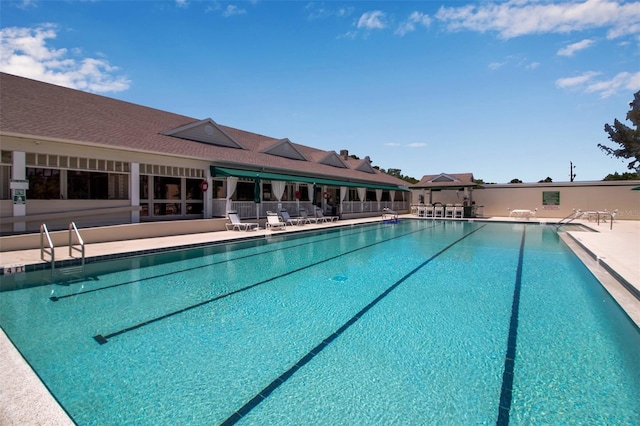 view of pool featuring a patio area