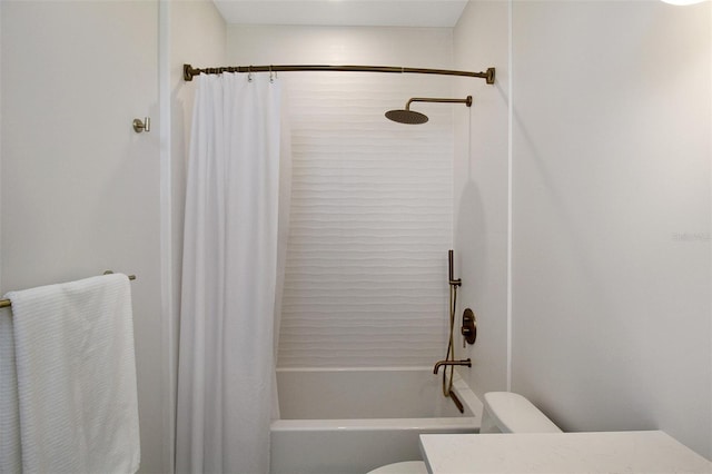 bathroom with shower / tub combo with curtain and toilet