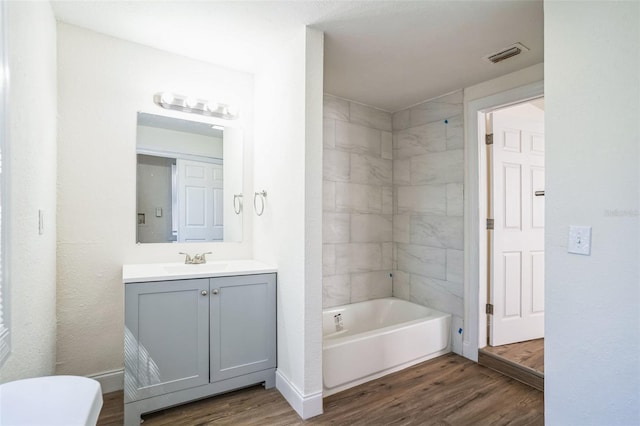 bathroom with wood-type flooring and vanity