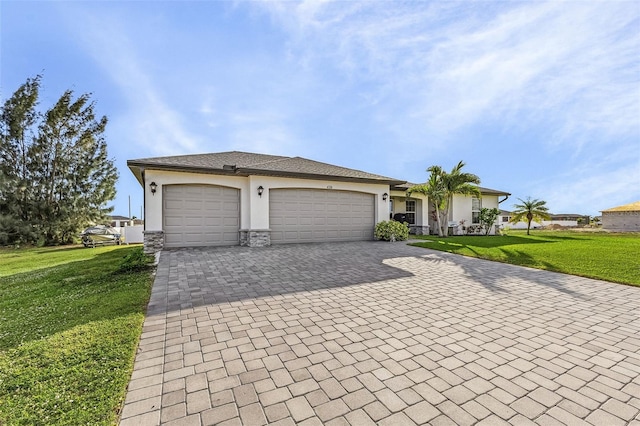 single story home featuring a front yard and a garage