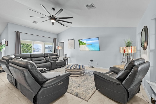 tiled living room featuring ceiling fan and lofted ceiling