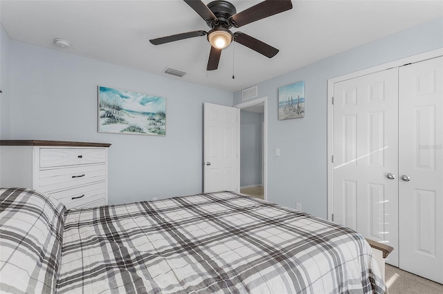 bedroom with ceiling fan, a closet, and light carpet