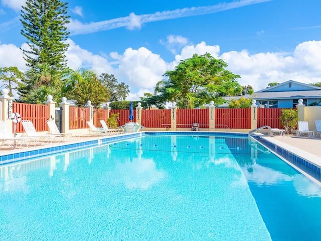 view of swimming pool with a patio