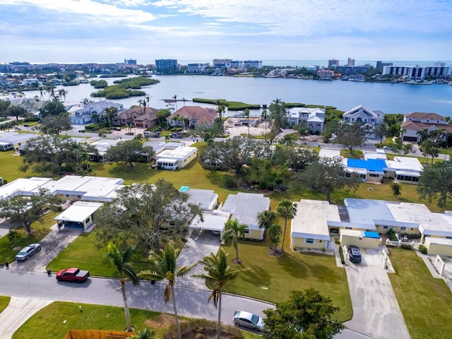 birds eye view of property featuring a water view