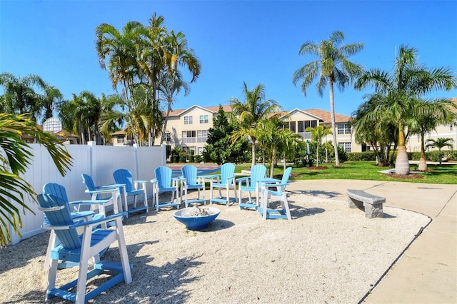 view of jungle gym featuring a lawn and a patio area