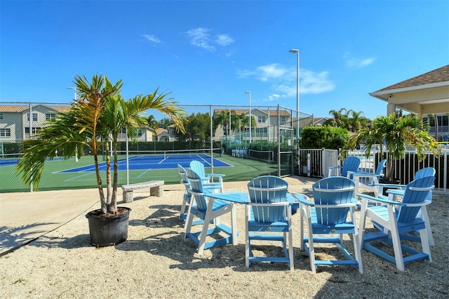 exterior space featuring tennis court