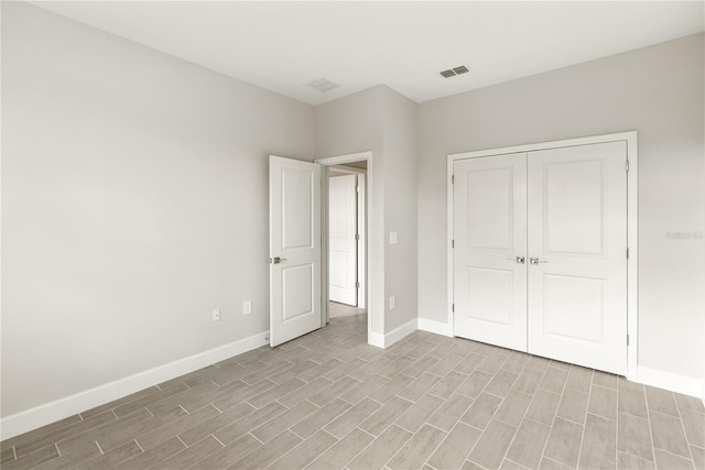 unfurnished bedroom featuring a closet