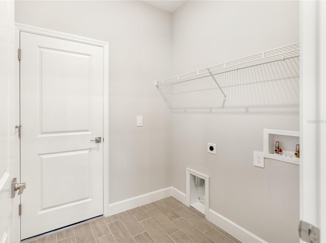 laundry room featuring hookup for an electric dryer and hookup for a washing machine