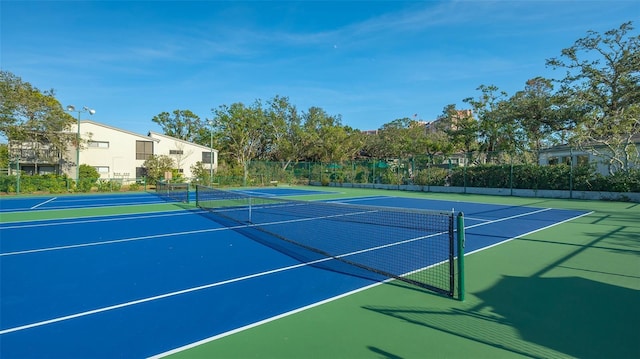 view of tennis court with basketball court