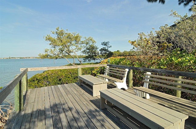 wooden terrace with a water view