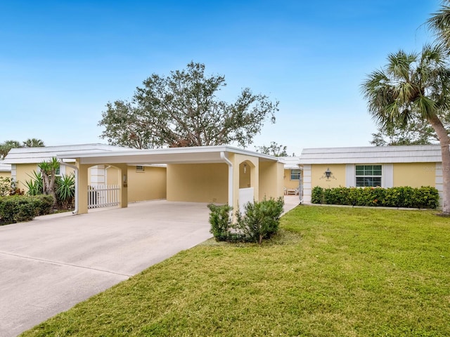 single story home with a carport and a front lawn