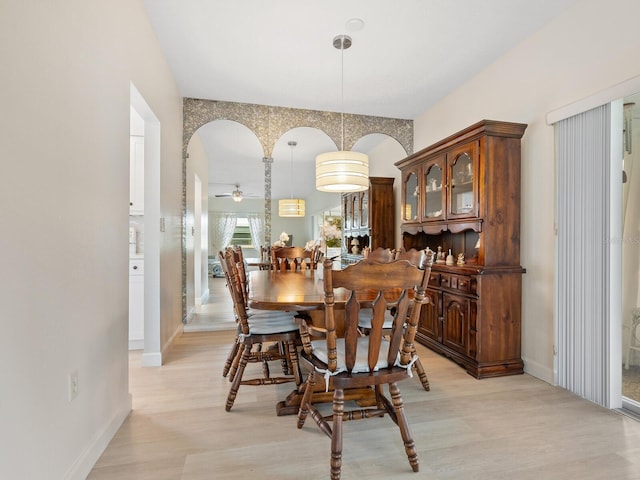 dining space with ceiling fan