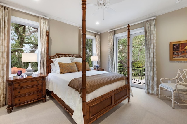 carpeted bedroom with access to exterior, ceiling fan, and ornamental molding