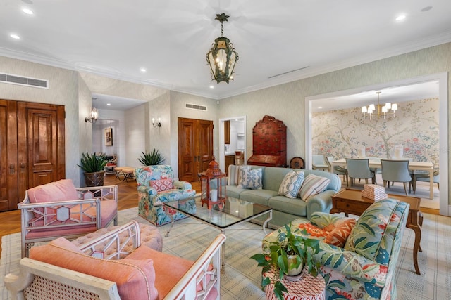 living area featuring visible vents, recessed lighting, a notable chandelier, and wallpapered walls