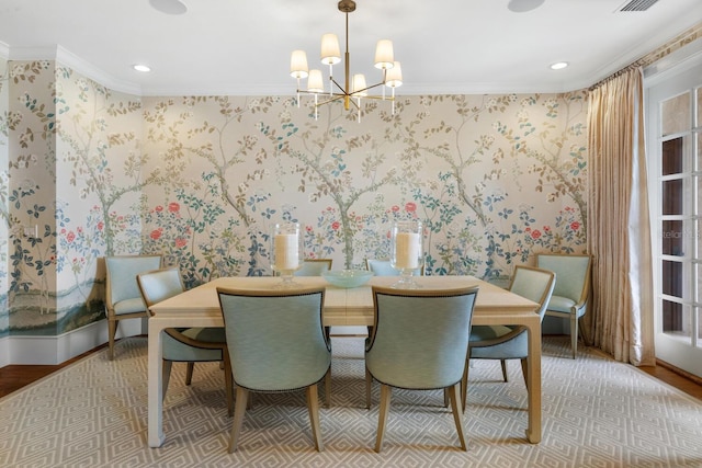dining area featuring recessed lighting, an inviting chandelier, ornamental molding, wallpapered walls, and wood finished floors