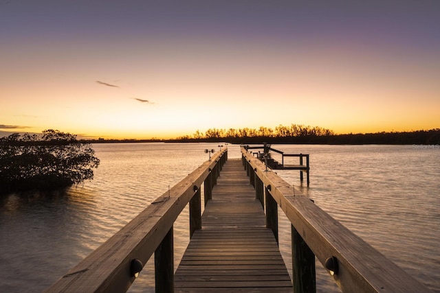 view of dock with a water view