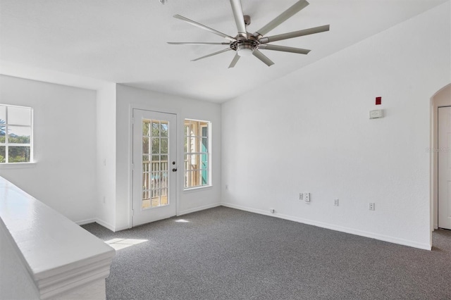 interior space with ceiling fan, plenty of natural light, and french doors