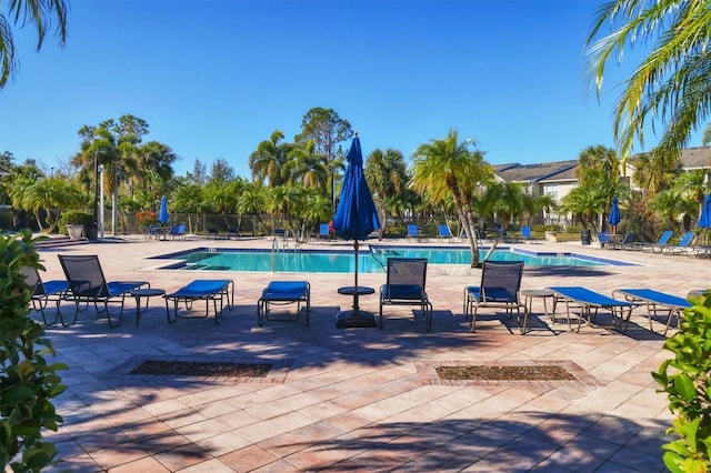 view of swimming pool featuring a patio