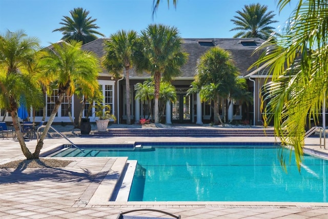 view of swimming pool featuring a patio area