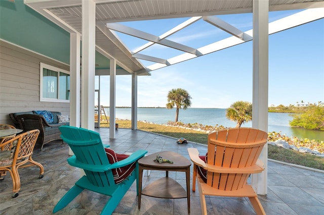 view of patio featuring a pergola, an outdoor hangout area, and a water view