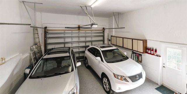 garage featuring a garage door opener