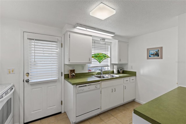 kitchen featuring white cabinetry, dishwasher, a healthy amount of sunlight, and sink