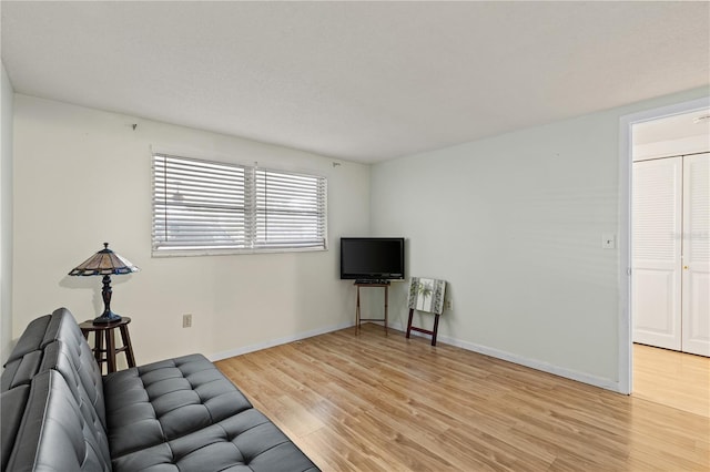 living area with light wood-type flooring