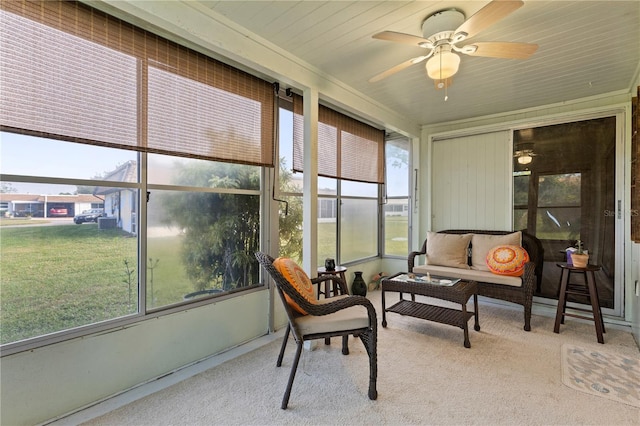 sunroom / solarium with ceiling fan