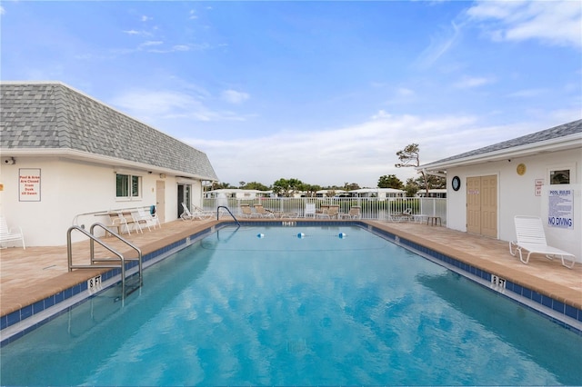 view of pool featuring a patio area