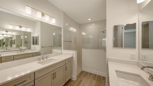 12649 Palatka Dr, Venice, FL 34293 - bathroom featuring a tile shower and vanity