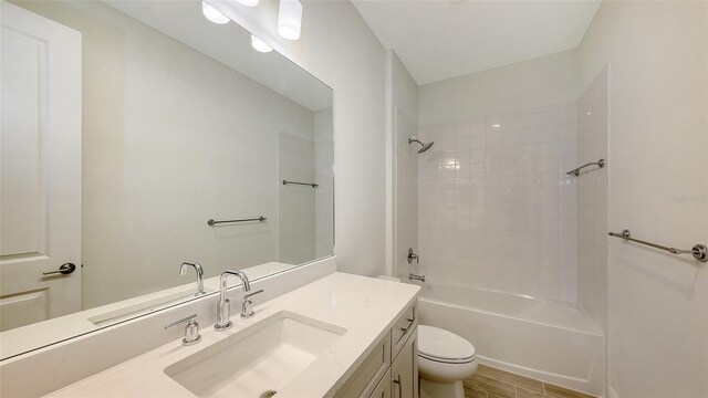 12649 Palatka Dr, Venice, FL 34293 - full bathroom with toilet, vanity, hardwood / wood-style floors, and shower / bath combination