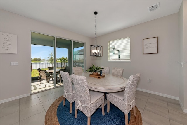 dining space with light tile patterned floors