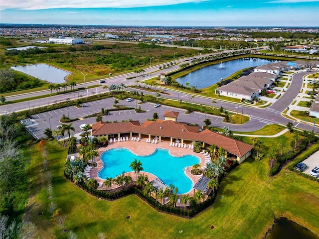 birds eye view of property featuring a water view