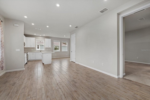 kitchen featuring white cabinets and a kitchen island