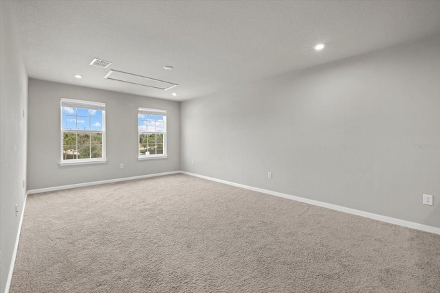 unfurnished room with carpet