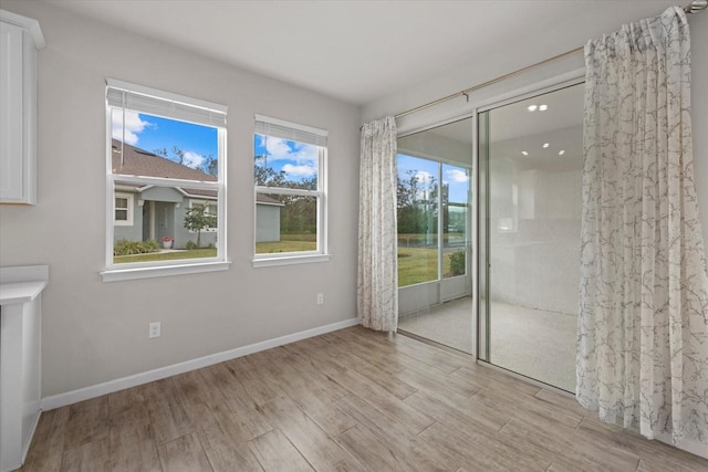 interior space with light hardwood / wood-style flooring