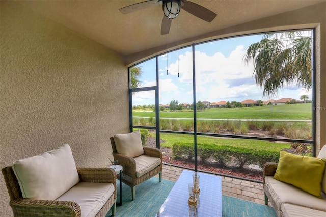 sunroom / solarium with ceiling fan